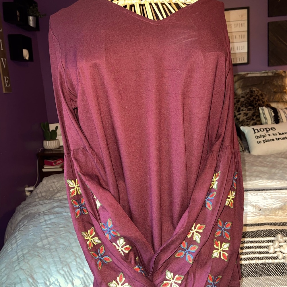 Burgundy colored shirt with stitched colors design